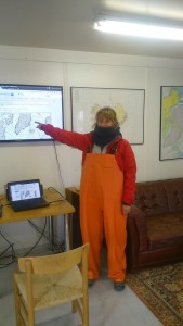 Pointing out the hurricane in the Reykjavik harbourmaster's office.